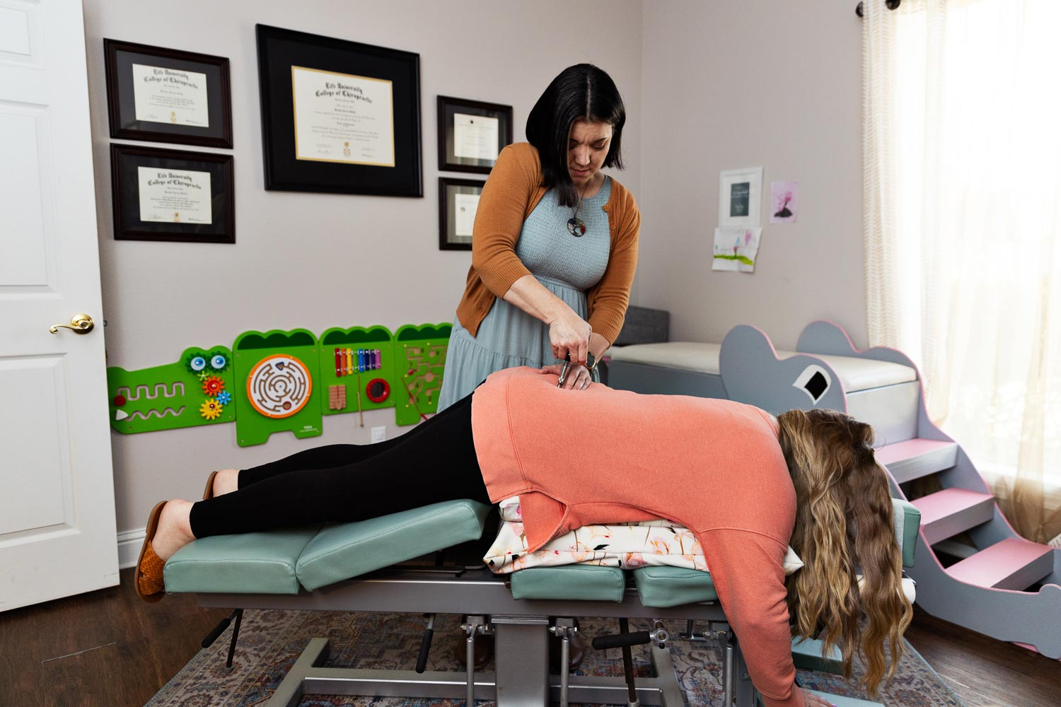 Dr. Kristin Smith at Life Care Family Wellness Chiropractic adjusting a prenatal patient
